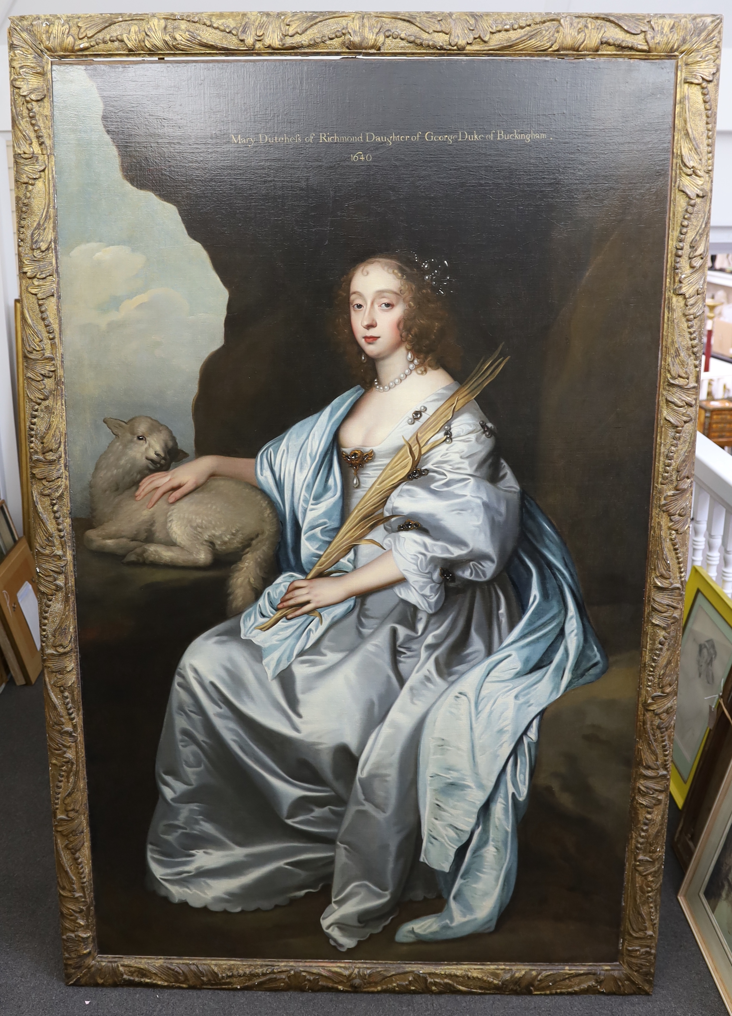 Studio of Sir Anthony Van Dyck (1599-1641), Portrait of Lady Mary Villiers (1622-1641), Lady Herbert and later Duchess of Lennox and Richmond (1622-1685), full-length, seated in a landscape as St Agnes, her right arm res